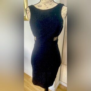 Speechless junior dress size 3. Glitter dress with mesh cut outs at waist.